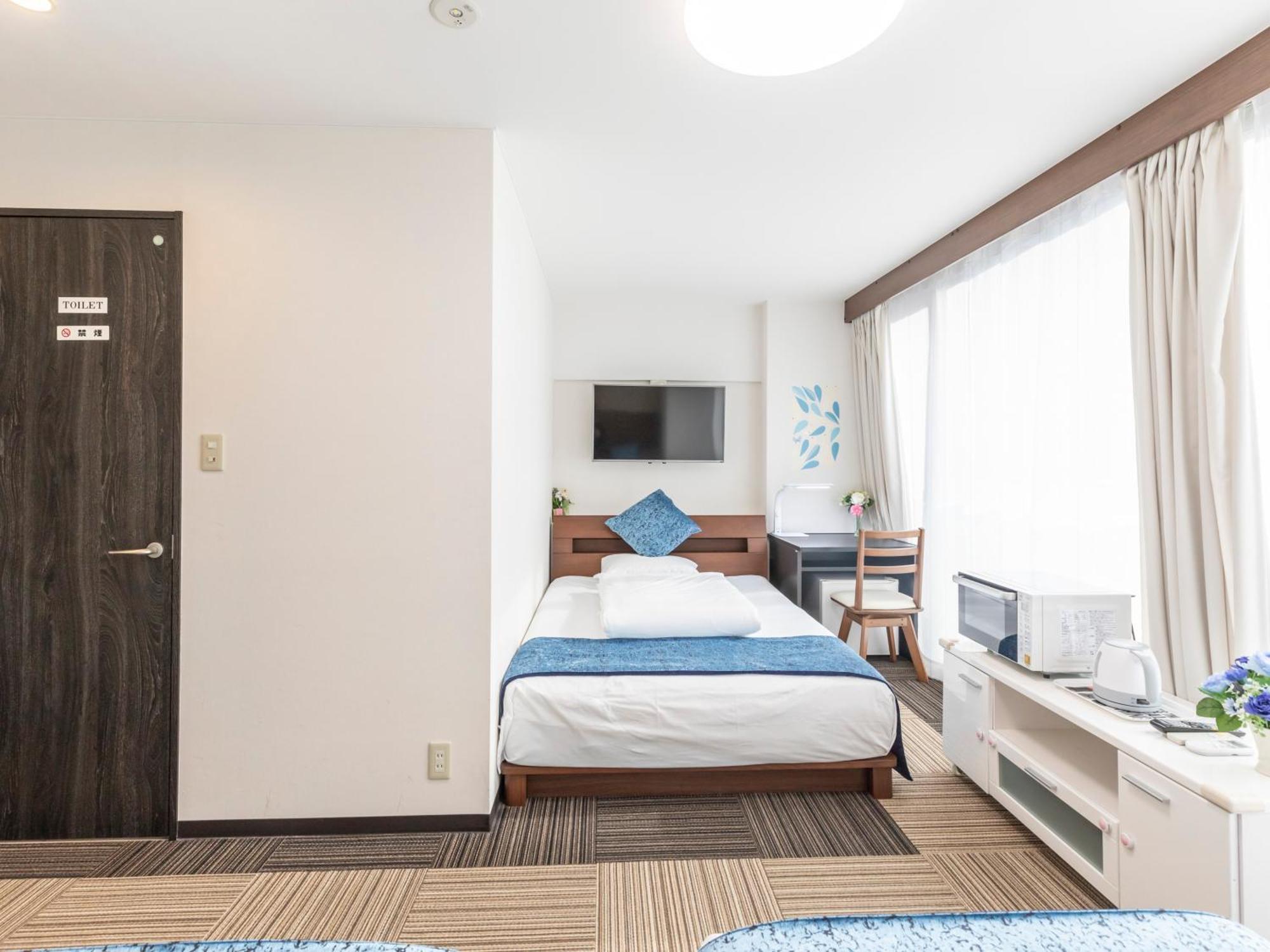 Tabist Sakuragawa River Side Hotel Osaka Room photo